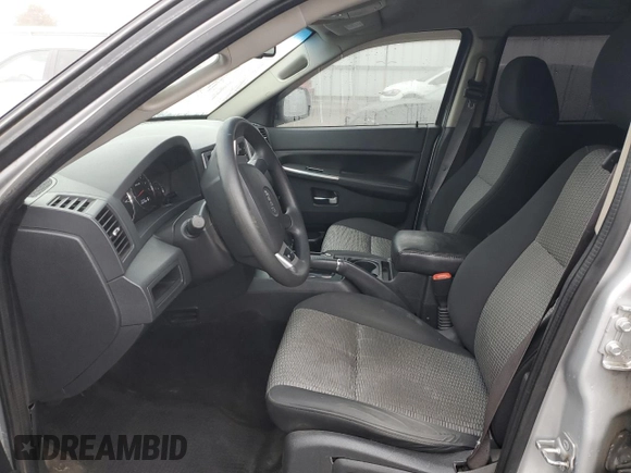 2009 Jeep Grand Cherokee Laredo with VIN 1J8HR48P19C555965, listed as a Copart auction lot 45602315 with 110,762 mi miles and Salvage Title. Bid and sale history available at carsss.com. Image 7.