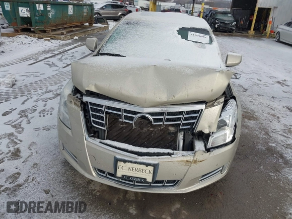 2014 Cadillac XTS Luxury z VIN 2G61M5S37E9304598, wystawiony jako IAAI lot #41006051 z przebiegiem 115 879 mil mil oraz . Historia ofert i sprzedaży dostępna na DreamBid. Obrazek 6.