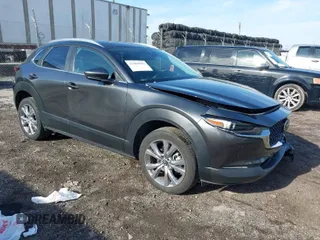 2022 Mazda CX-30 2.5 S Select Package with VIN 3MVDMBBL6NM447914, listed as a IAAI auction lot 41660946 with 1 mi miles. Bid and sale history available at carsss.com. Image 1.