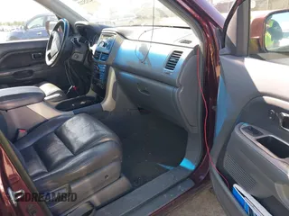 2007 Honda Pilot EX-L z VIN 5FNYF18567B011233, wystawiony jako IAAI lot #42325222 z przebiegiem 195 581 mil mil oraz . Historia ofert i sprzedaży dostępna na DreamBid. Obrazek 5.