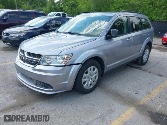 2016 Dodge Journey American Value with VIN 3C4PDCAB0GT134279, listed as a IAAI auction lot 42234584 with 166,437 mi miles and . Bid and sale history available at DreamBid. Image 2.