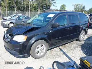 2012 Dodge Grand Caravan SXT with VIN 2C4RDGCG2CR319651, listed as a IAAI auction lot 42097594 with 155,521 mi miles and . Bid and sale history available at DreamBid. Image 17.