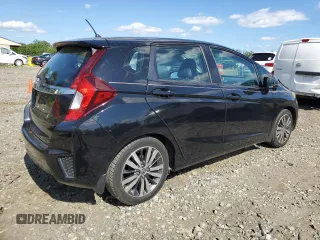 2015 Honda Fit EX-L z VIN 3HGGK5H88FM705989, wystawiony jako Copart lot #57143835 z przebiegiem 132 747 mil mil oraz Szkoda całkowita • Salvage title. Historia ofert i sprzedaży dostępna na DreamBid. Obrazek 3.