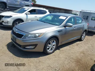 2013 Kia Optima EX with VIN 5XXGN4A77DG244364, listed as a IAAI auction lot 42179051 with 184,416 mi miles and . Bid and sale history available at carsss.com. Image 2.