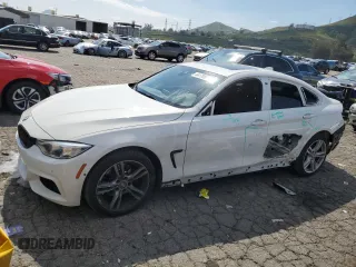 2015 BMW 4 Series 428i xDrive with VIN WBA4C9C58FG135227, listed as a Copart auction lot 44178973 with 91,571 mi miles and . Bid and sale history available at DreamBid. Image 1.