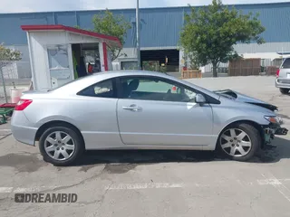 2010 Honda Civic Cpe LX with VIN 2HGFG1B64AH519662, listed as a IAAI auction lot 42006635 with 84,119 mi miles. Bid and sale history available at carsss.com. Image 13.