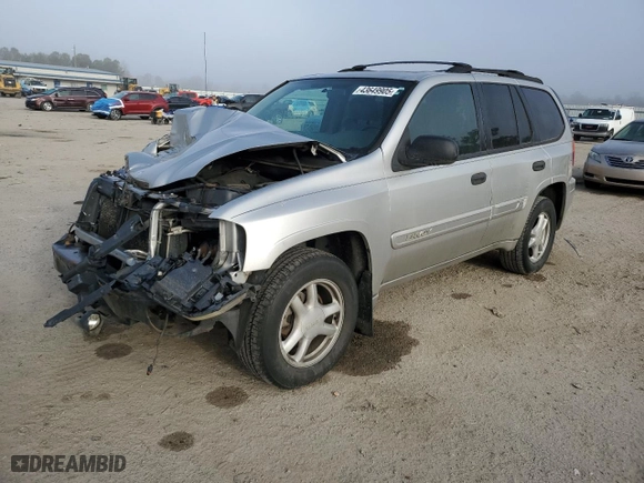 2004 GMC Envoy SLE with VIN 1GKDT13S942422049, listed as a Copart auction lot 43649905 with 150,713 mi miles and Salvage Title. Bid and sale history available at carsss.com. Image 1.