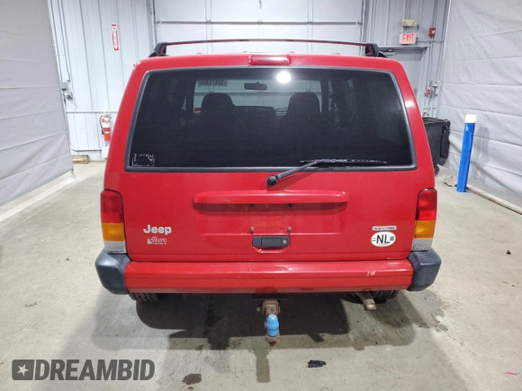 2000 Jeep Cherokee z VIN 1J4FF48S9YL260200, wystawiony jako Copart lot #52471365 z przebiegiem 89 435 mil mil oraz Szkody całkowita. Historia ofert i sprzedaży dostępna na DreamBid. Obrazek 6.