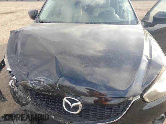 2014 Mazda CX-5 Touring with VIN JM3KE2CY9E0336218, listed as a Copart auction lot 49213255 with 124,749 mi miles and Salvage Title. Bid and sale history available at carsss.com. Image 12.