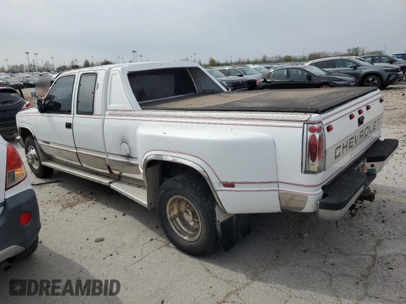 1989 GMC Sierra 1500 with VIN 2GTHC39K3K1532298, listed as a Copart auction lot 51497065 with 233,797 mi miles and Salvage Title. Bid and sale history available at DreamBid. Image 2.