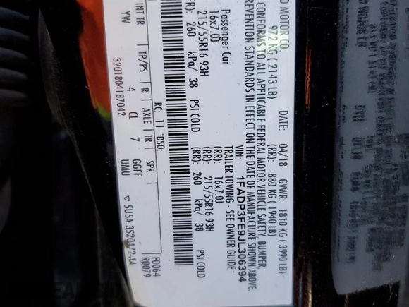 2018 Ford Focus SE with VIN 1FADP3FE9JL306394, listed as a Copart auction lot 52902175 with 77,338 mi miles and Salvage title. Bid and sale history available at DreamBid. Image 12.