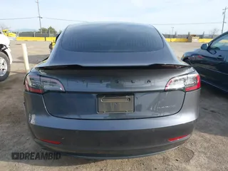 2019 Tesla Model 3 Long Range with VIN 5YJ3E1EB6KF413320, listed as a IAAI auction lot 41760428 with 90,441 mi miles and . Bid and sale history available at DreamBid. Image 15.