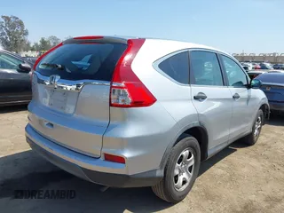 2015 Honda CR-V LX with VIN 3CZRM3H37FG706005, listed as a IAAI auction lot 41968907 with 107,690 mi miles and . Bid and sale history available at carsss.com. Image 4.