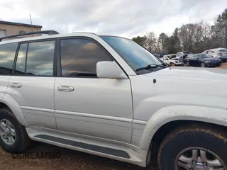 2000 Lexus LX 470 z VIN JT6HT00W9Y0103225, wystawiony jako IAAI lot #41148826 z przebiegiem 270 351 mil mil oraz . Historia ofert i sprzedaży dostępna na DreamBid. Obrazek 13.
