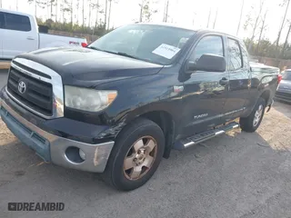2011 Toyota Tundra 2WD Truck with VIN 5TFRY5F17BX105318, listed as a IAAI auction lot 41519904 with 258,210 mi miles. Bid and sale history available at carsss.com. Image 17.