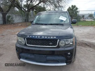 2013 Land Rover Range Rover Sport SC with VIN SALSH2E48DA802796, listed as a IAAI auction lot 41613187 with 104,024 mi miles. Bid and sale history available at carsss.com. Image 6.