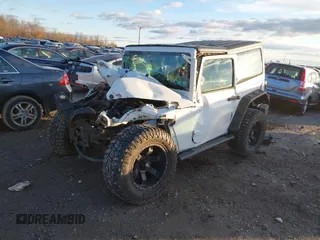 2015 Jeep Wrangler Sport with VIN 1C4AJWAG0FL516351, listed as a IAAI auction lot 41178594 with 49,700 mi miles and . Bid and sale history available at DreamBid. Image 16.