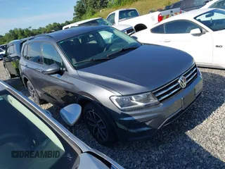 2021 Volkswagen Tiguan S z VIN 3VV1B7AX7MM038431, wystawiony jako IAAI lot #42726529 z przebiegiem 82 289 mil mil oraz . Historia ofert i sprzedaży dostępna na DreamBid. Obrazek 1.