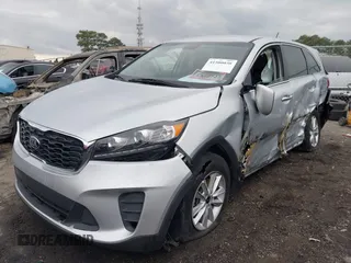 2020 Kia Sorento LX with VIN 5XYPG4A52LG627955, listed as a IAAI auction lot 41500038 with 150,464 mi miles and . Bid and sale history available at DreamBid. Image 2.