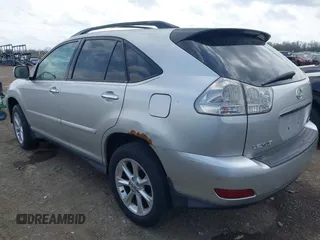 2008 Lexus RX with VIN 2T2HK31U58C053306, listed as a IAAI auction lot 42066973 with 184,266 mi miles. Bid and sale history available at carsss.com. Image 3.