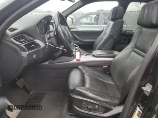 2012 BMW X5 M with VIN 5YMGY0C53CLK27448, listed as a Copart auction lot 80757454 with 146,435 mi miles and Salvage Title. Bid and sale history available at carsss.com. Image 7.