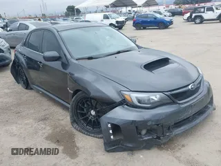 2011 Subaru WRX WRX Premium z VIN JF1GV7F6XBG512627, wystawiony jako IAAI lot #42185318 z przebiegiem 179 423 mil mil oraz . Historia ofert i sprzedaży dostępna na DreamBid. Obrazek 1.