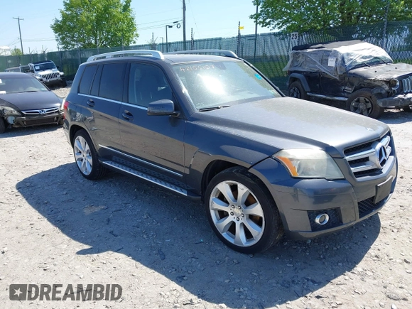 2010 Mercedes-Benz GLK with VIN WDCGG8HB8AF464015, listed as a IAAI auction lot 42155107 with 116,787 mi miles. Bid and sale history available at carsss.com. Image 1.