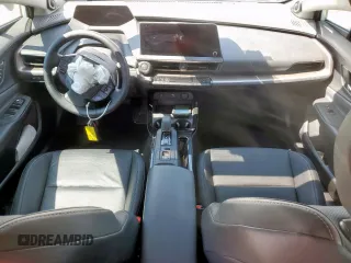 2024 Toyota Prius LE z VIN JTDACAAUXR3022411, wystawiony jako Copart lot #58263865 z przebiegiem 12 783 mil mil oraz Szkoda całkowita • Salvage title. Historia ofert i sprzedaży dostępna na DreamBid. Obrazek 8.