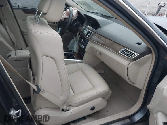 2014 Mercedes-Benz E 350 Sport with VIN WDDHF5KB7EA779952, listed as a IAAI auction lot 42308290 with 100,000 mi miles and . Bid and sale history available at DreamBid. Image 5.
