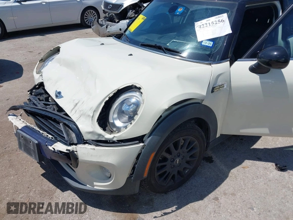 2016 MINI Hardtop 4 Door z VIN WMWXU1C50G2D08848, wystawiony jako IAAI lot #42215256 z przebiegiem 102 643 mil mil oraz . Historia ofert i sprzedaży dostępna na DreamBid. Obrazek 6.