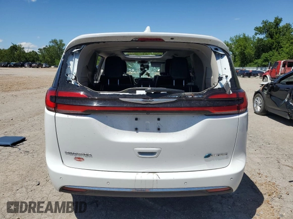 2022 Chrysler Pacifica Hybrid Limited z VIN 2C4RC1S7XNR123039, wystawiony jako Copart lot #57786915 z przebiegiem 61 616 mil mil oraz Szkoda całkowita • Salvage title. Historia ofert i sprzedaży dostępna na DreamBid. Obrazek 6.