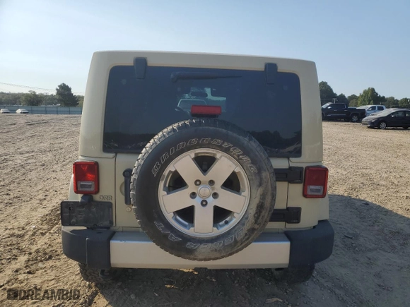 2011 Jeep Wrangler Unlimited Sahara with VIN 1J4BA5H10BL558961, listed as a Copart auction lot 74806494 with 172,855 mi miles and Salvage Title. Bid and sale history available at carsss.com. Image 6.