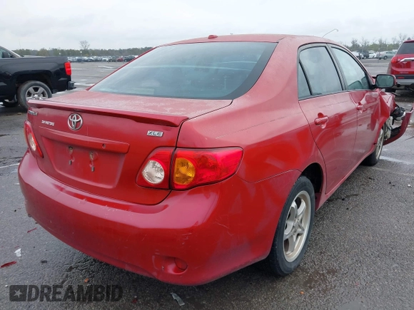 2009 Toyota Corolla with VIN 1NXBU40E09Z099663, listed as a IAAI auction lot 41069276 with 187,726 mi miles. Bid and sale history available at carsss.com. Image 4.