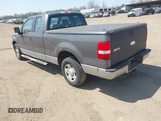 2007 Ford F-150 STX with VIN 1FTRX12W57FB45746, listed as a IAAI auction lot 41786902 with 242,405 mi miles and . Bid and sale history available at DreamBid. Image 3.