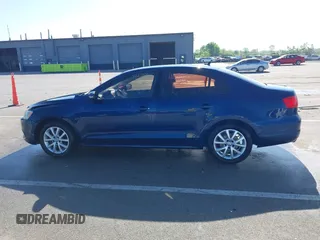 2011 Volkswagen Jetta SE with VIN 3VWDZ7AJ5BM319334, listed as a IAAI auction lot 42275321 with 111,989 mi miles and . Bid and sale history available at DreamBid. Image 14.