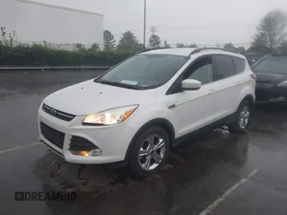 2016 Ford Escape SE with VIN 1FMCU0GX4GUC23998, listed as a IAAI auction lot 41917522 with 96,491 mi miles and . Bid and sale history available at carsss.com. Image 2.