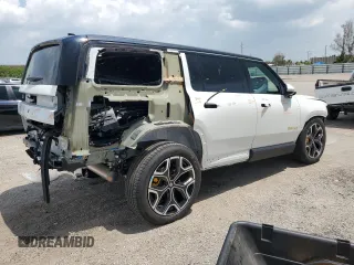 2023 Rivian R1S Adventure z VIN 7PDSGABA7PN021756, wystawiony jako Copart lot #67650414 z przebiegiem 3284 mil mil oraz Szkody całkowita. Historia ofert i sprzedaży dostępna na DreamBid. Obrazek 3.