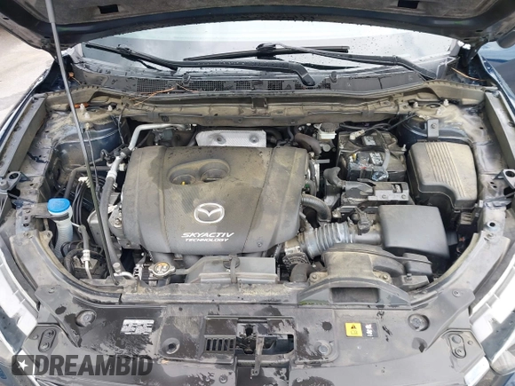 2016 Mazda CX-5 Sport with VIN JM3KE2BY0G0850298, listed as a IAAI auction lot 42107007 with 97,478 mi miles. Bid and sale history available at carsss.com. Image 10.