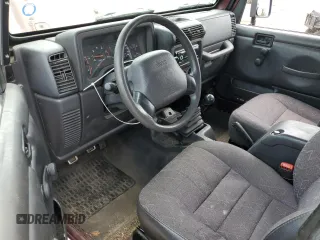 2002 Jeep Wrangler X z VIN 1J4FA39S42P773815, wystawiony jako Copart lot #60016255 z przebiegiem 174 803 mil mil oraz Szkoda całkowita • Salvage title. Historia ofert i sprzedaży dostępna na DreamBid. Obrazek 8.
