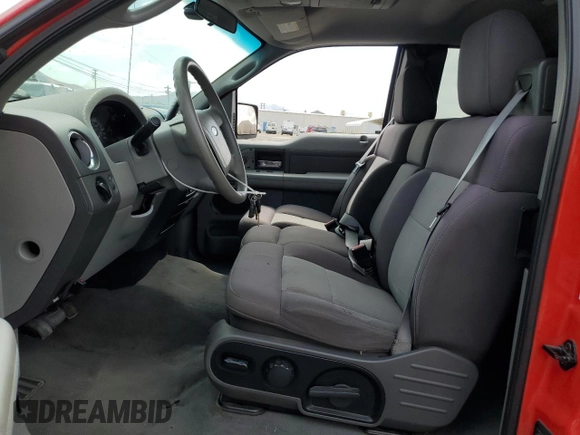 2004 Ford F-150 STX with VIN 1FTRX02W44KB96118, listed as a Copart auction lot 71984374 with 146,820 mi miles and Salvage title. Bid and sale history available at DreamBid. Image 7.