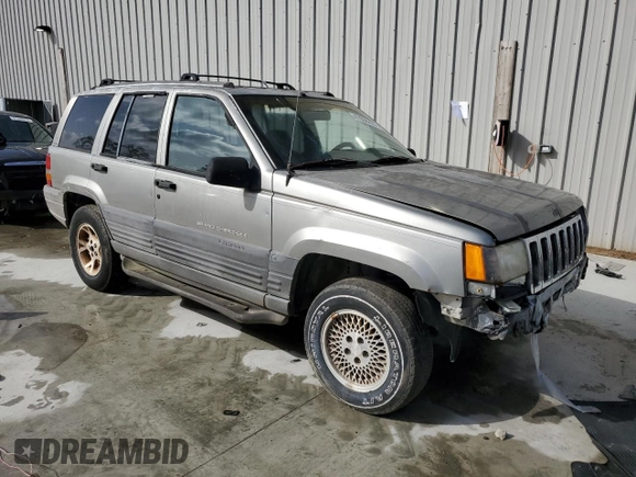1998 Jeep Grand Cherokee Laredo with VIN 1J4FX58S1WC130492, listed as a Copart auction lot 47656265 with 0 mi miles and Salvage Title. Bid and sale history available at carsss.com. Image 4.