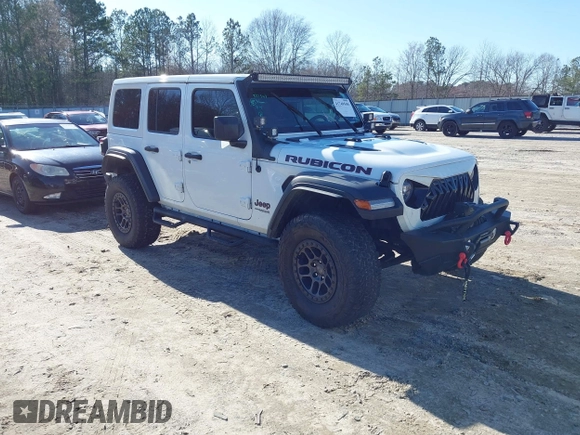 2022 Jeep Wrangler Unlimited Rubicon z VIN 1C4JJXFGXNW121489, wystawiony jako IAAI lot #41749550 z przebiegiem 56 601 mil mil oraz . Historia ofert i sprzedaży dostępna na DreamBid. Obrazek 1.