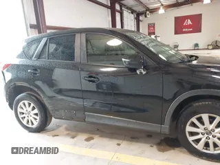 2016 Mazda CX-5 Touring with VIN JM3KE2CY7G0867355, listed as a IAAI auction lot 41963169 with 117,727 mi miles and . Bid and sale history available at DreamBid. Image 13.