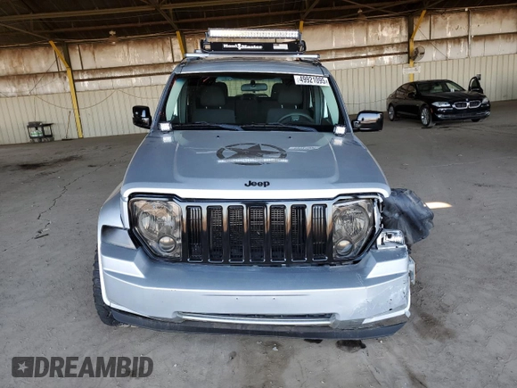 2011 Jeep Liberty Sport with VIN 1J4PN2GK5BW550971, listed as a Copart auction lot 49921095 with 141,877 mi miles and Salvage Title. Bid and sale history available at DreamBid. Image 5.
