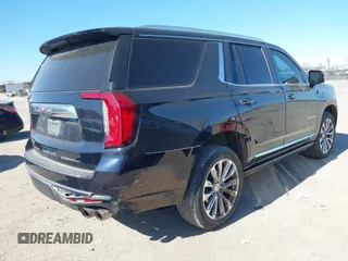 2021 GMC Yukon Denali with VIN 1GKS2DKL1MR135771, listed as a IAAI auction lot 41403680 with 61,772 mi miles. Bid and sale history available at carsss.com. Image 4.