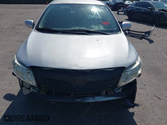 2010 Toyota Corolla with VIN 1NXBU4EE2AZ240438, listed as a IAAI auction lot 42125407 with 185,253 mi miles and . Bid and sale history available at DreamBid. Image 13.