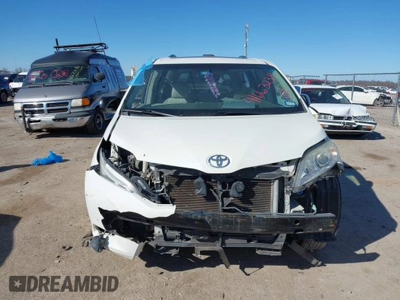 2011 Toyota Sienna XLE AAS with VIN 5TDYK3DCXBS126143, listed as a IAAI auction lot 41663238 with 154,238 mi miles. Bid and sale history available at carsss.com. Image 13.