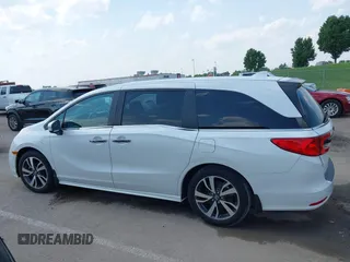 2023 Honda Odyssey Touring with VIN 5FNRL6H8XPB038875, listed as a IAAI auction lot 42441076 with 13,947 mi miles and . Bid and sale history available at DreamBid. Image 14.