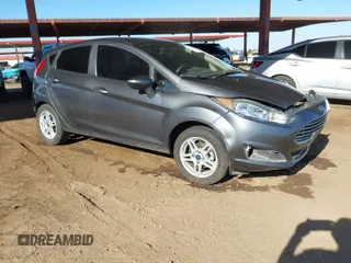 2019 Ford Fiesta SE with VIN 3FADP4EJ8KM101816, listed as a IAAI auction lot 41615459 with 71,028 mi miles. Bid and sale history available at carsss.com. Image 1.