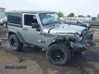 2013 Jeep Wrangler Rubicon 10th Anniversary with VIN 1C4BJWCG8DL639121, listed as a IAAI auction lot 40561773 with 56,023 mi miles and . Bid and sale history available at carsss.com. Image 1.